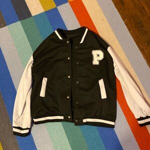 It’s very clean black and white jacket for 13,14years old